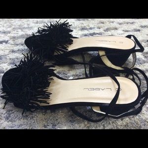 Suede leather  wrap around tie with tazzles